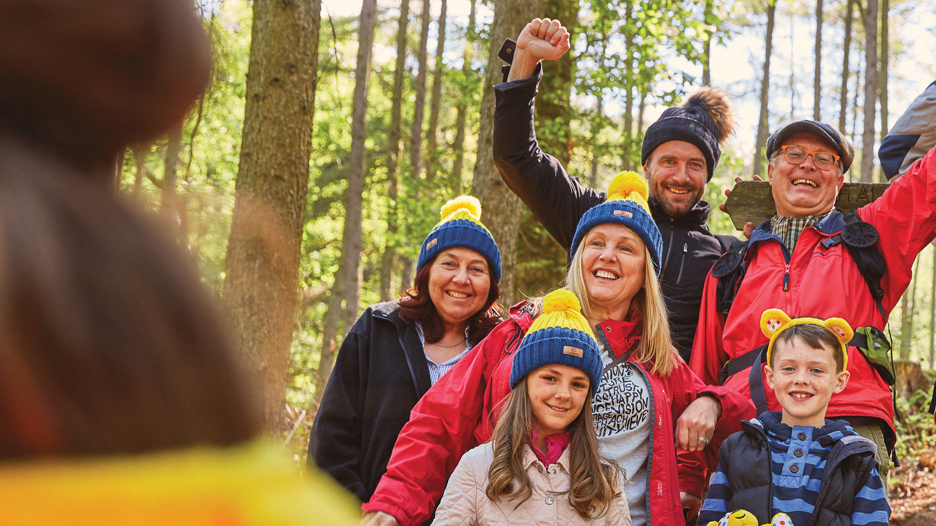 Family taking a ramble in the woods.