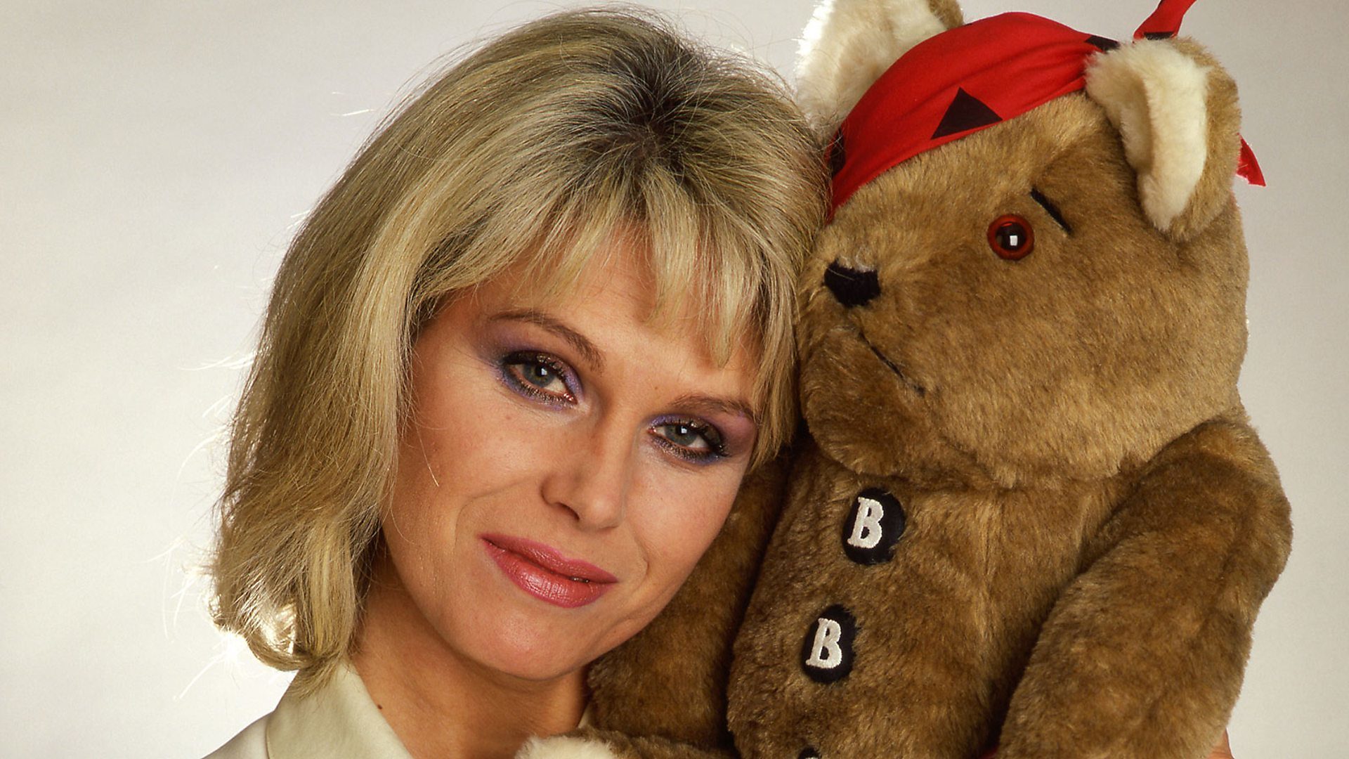 Joanna Lumley and the original Pudsey from 1985
