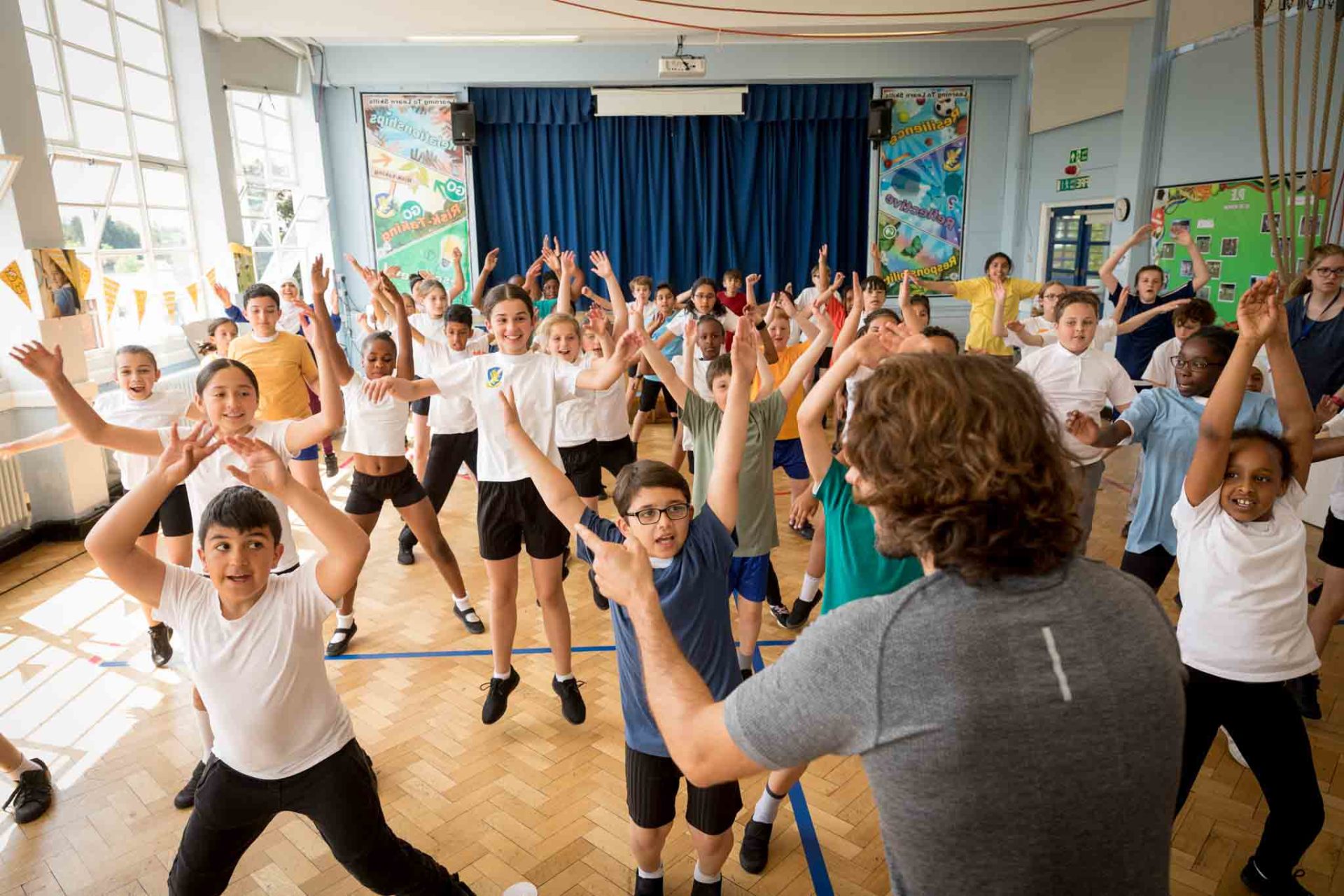 group of children exercising in the gym