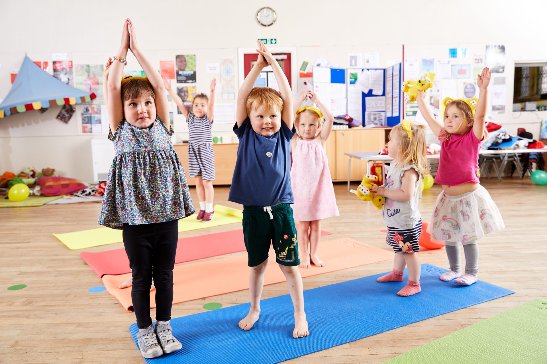 nursery children doing yoga