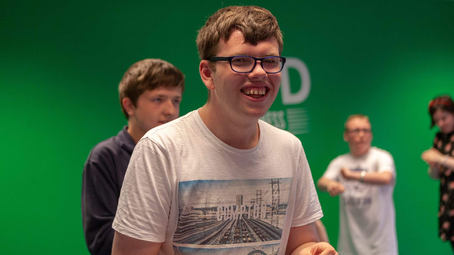 Group of young people dancing and smiling