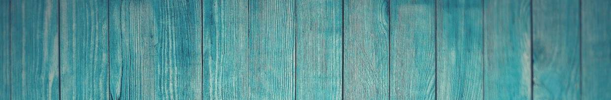 A blue painted wooden wall