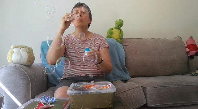 Jane blowing bubbles