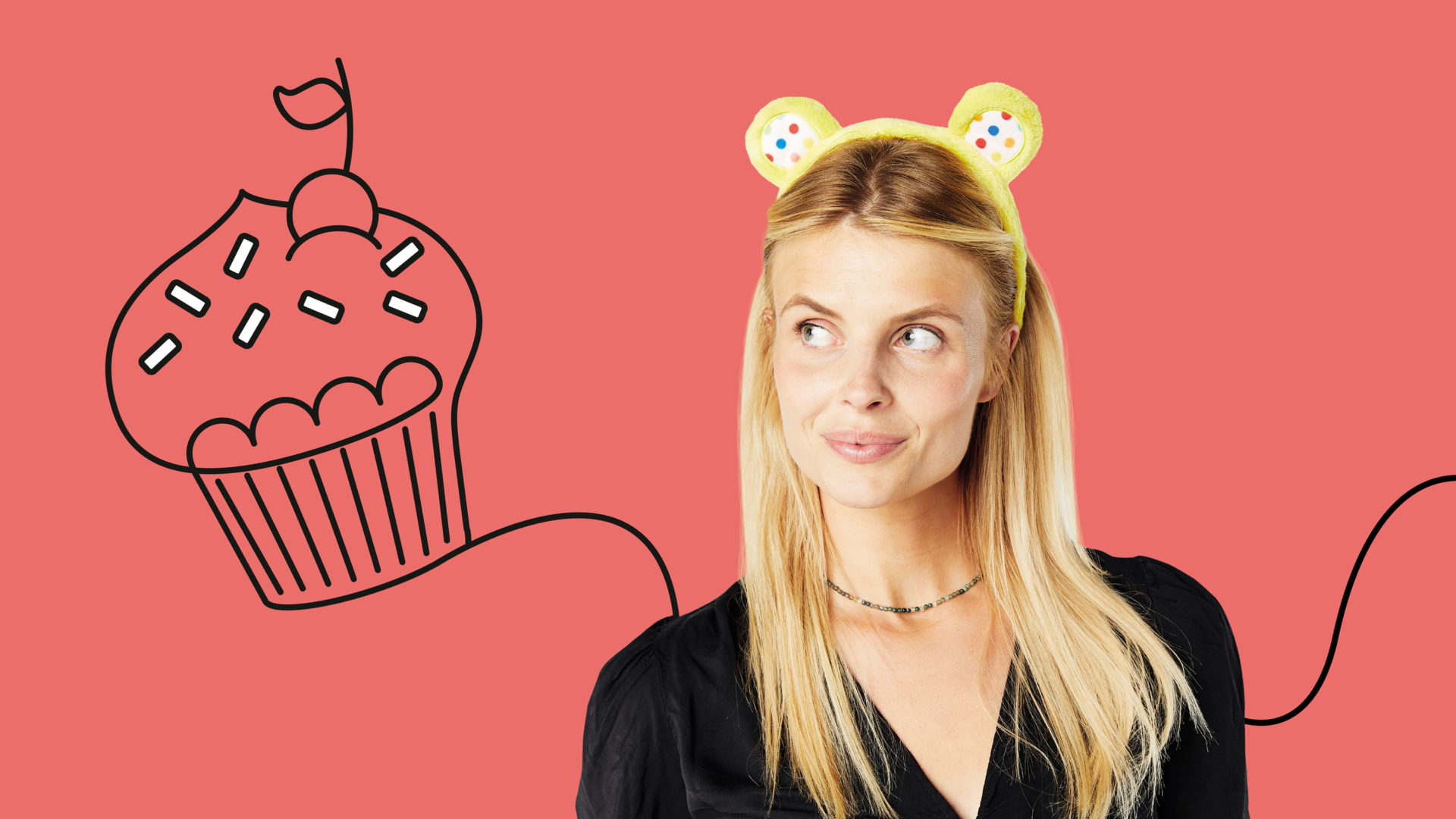 a lady wearing pudsey ears with an illustrated cupcake