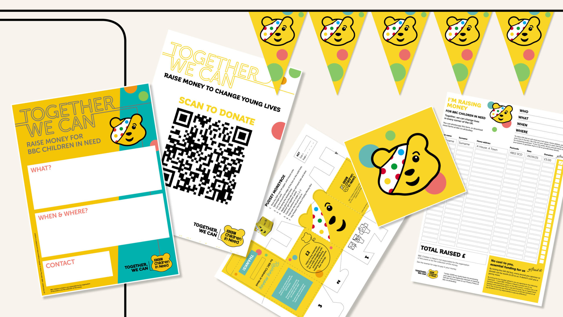 An image of various fundraising resources such as a poster and moneybox