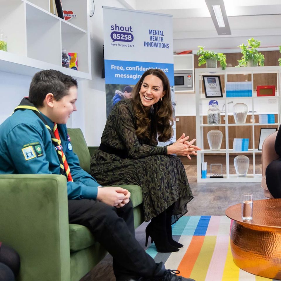 The Duchess of Cambridge with a young boy at Shout