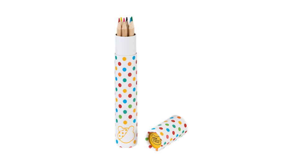 A set of colouring pencils in a colourful spotty cardboard tube