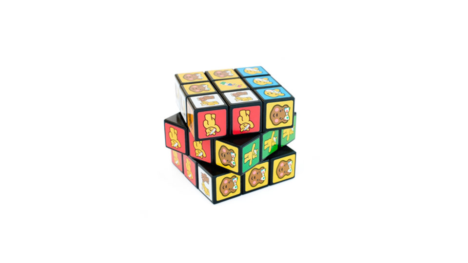 A rubiks cube with images on Pudsey and Blush within each square