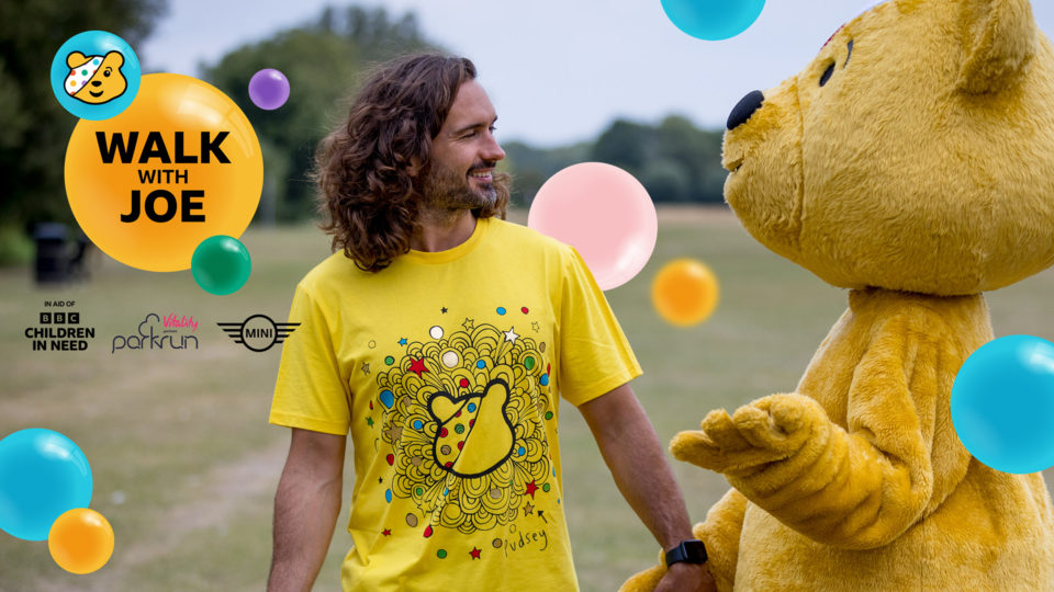 Joe Wickes smiling with Pudsey