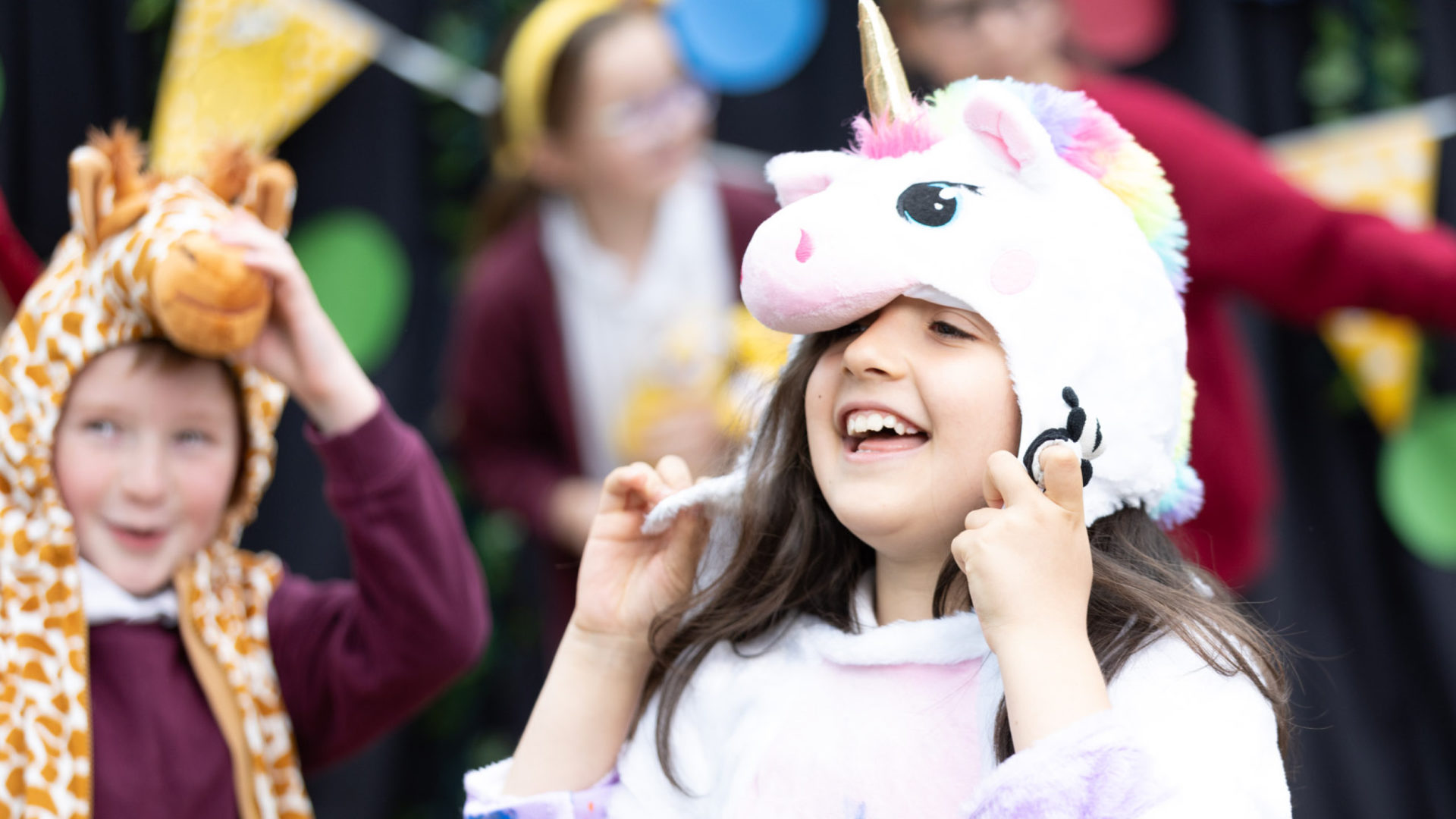 a girl dressed up as a unicorn