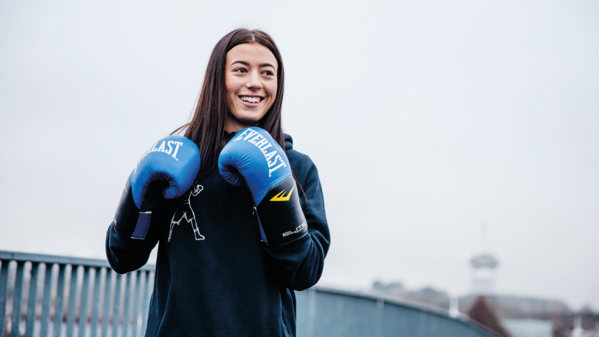 Enya wearing boxing gloves
