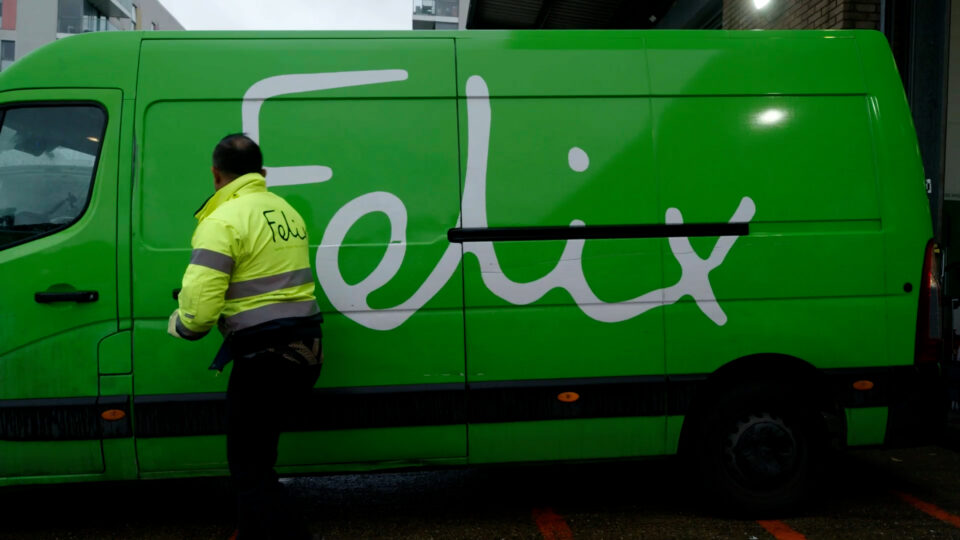 A green van with the word 'Felix' written on the side