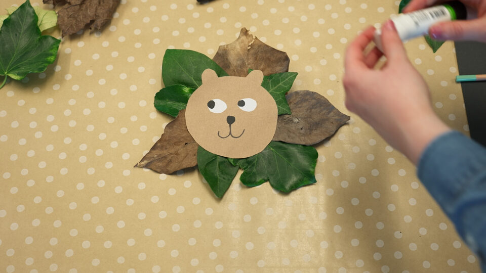Leaves being made into a lion's head