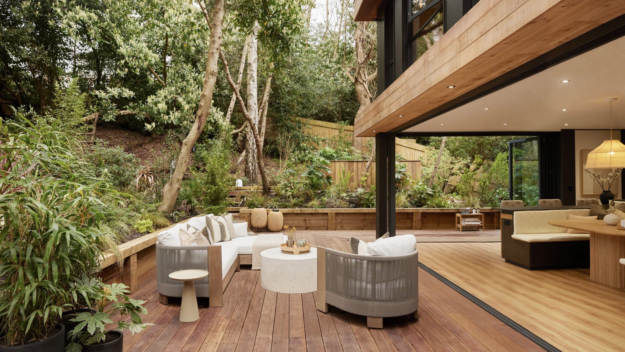 A black and wooden modern house- the garden