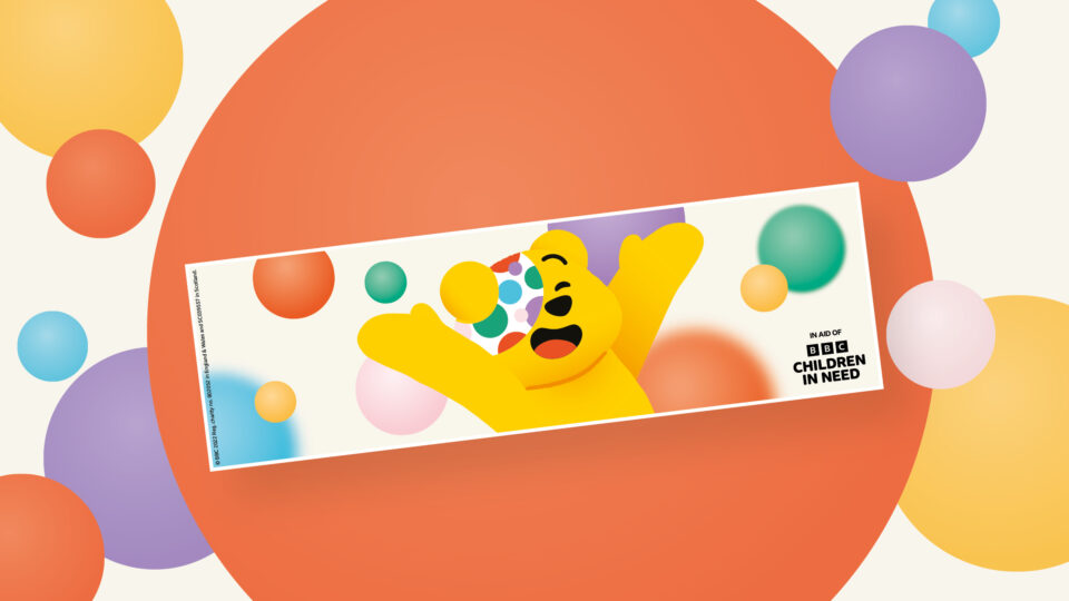 A rectangular label with a happy Pudsey Bear image and an 'In aid of BBC Children in Need' logo