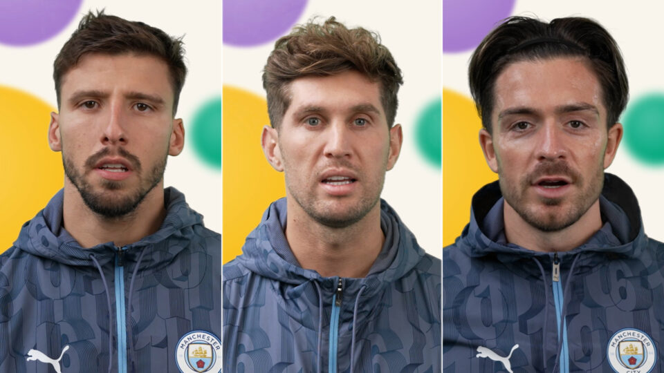 Manchester City players Ruben Dias, John Stones and Jack Grealish