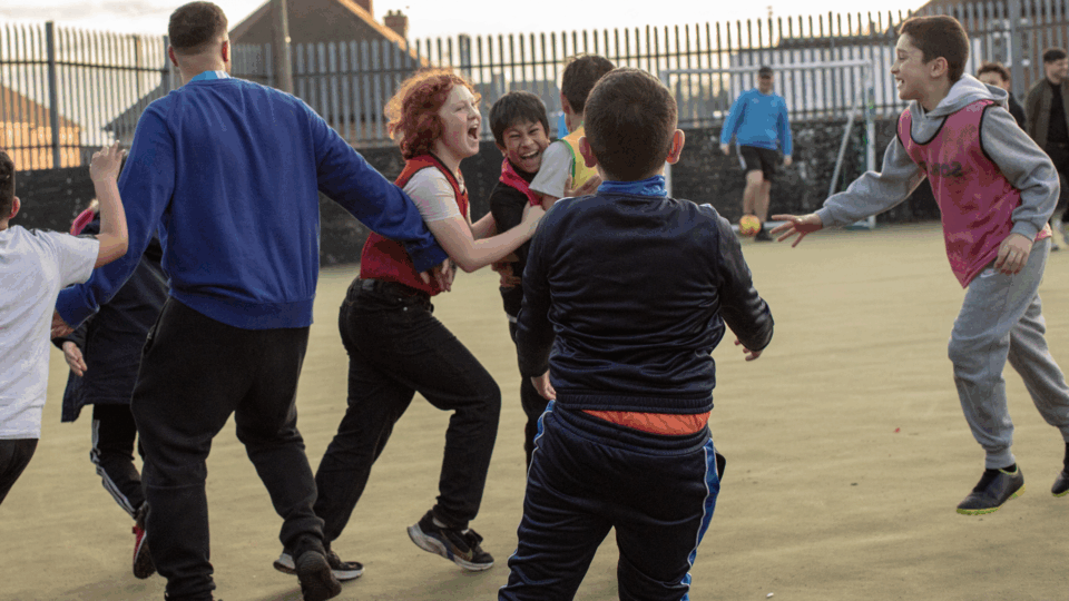 Teenagers playing outside