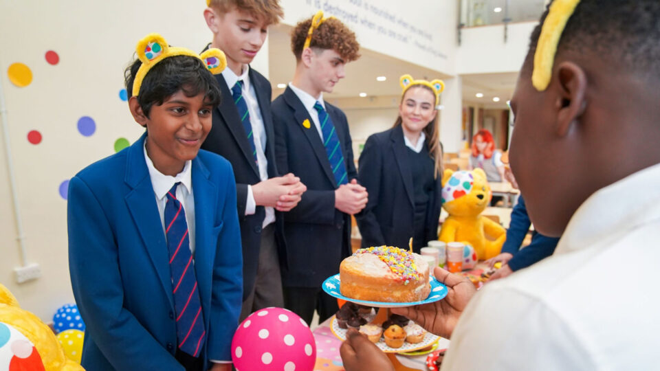 Schoolchildren hosting a bake sale