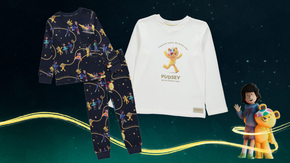 A t-shirt and some pajamas with images of Pudsey from the Thread of Hope animation