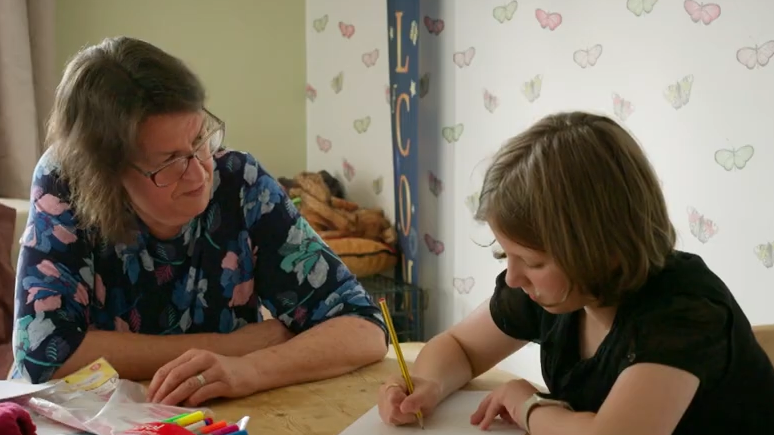 children playing football wearing Pudsey style yellow ears